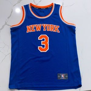 Knicks jersey package of two former players. Dennis smith jr. and Tim hardaway.